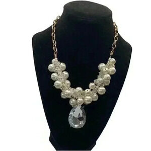 Faux pearl statement necklace with crystal pendant. 16 inches